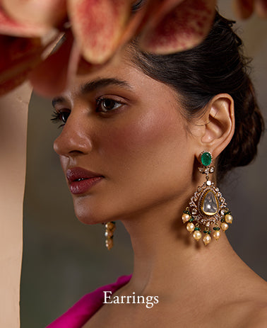 Designer gold and diamond earrings