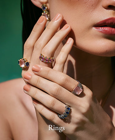 Elegant gold ring with intricate design and sparkling gemstone